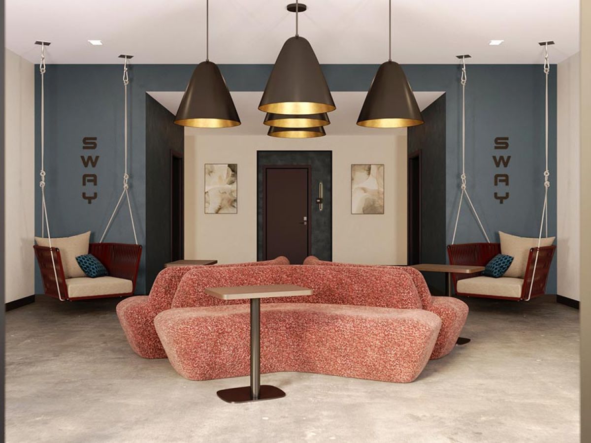 Westrum Corporate Modern lounge at Luxor, Fort Washington with curved pink couches, pendant lights, swinging chairs, and “SWAY” signs on blue walls.